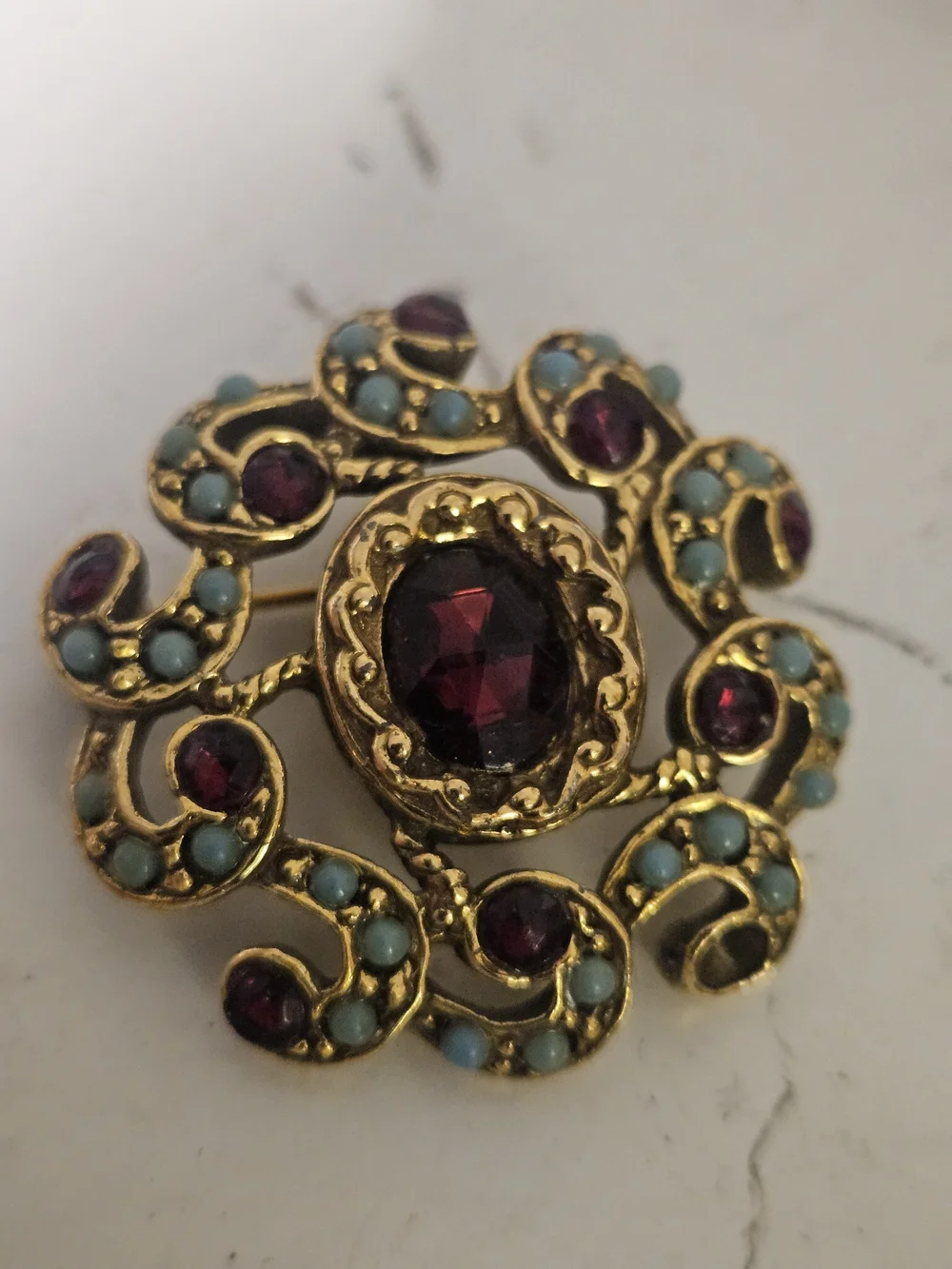 Gold-Tone Floral Brooch with Deep Red and Turquoise Accents
